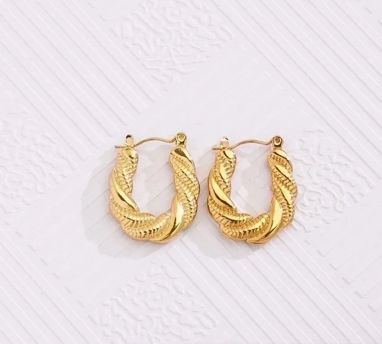 Twisted ear hoops