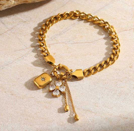 Four leaf clover and sun bracelet